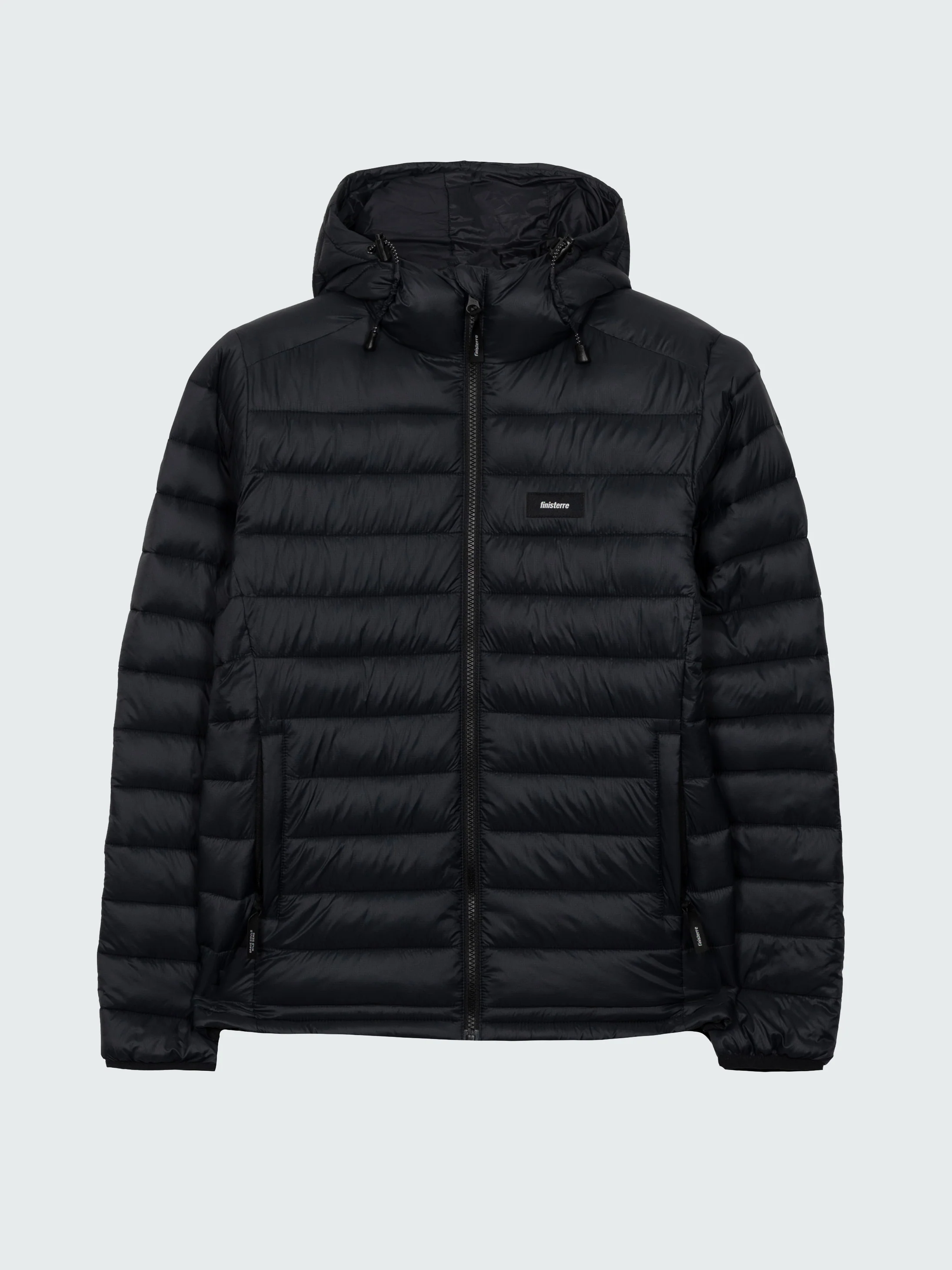 Finisterre Nimbus jacket used as the weather layer in a travel capsule
